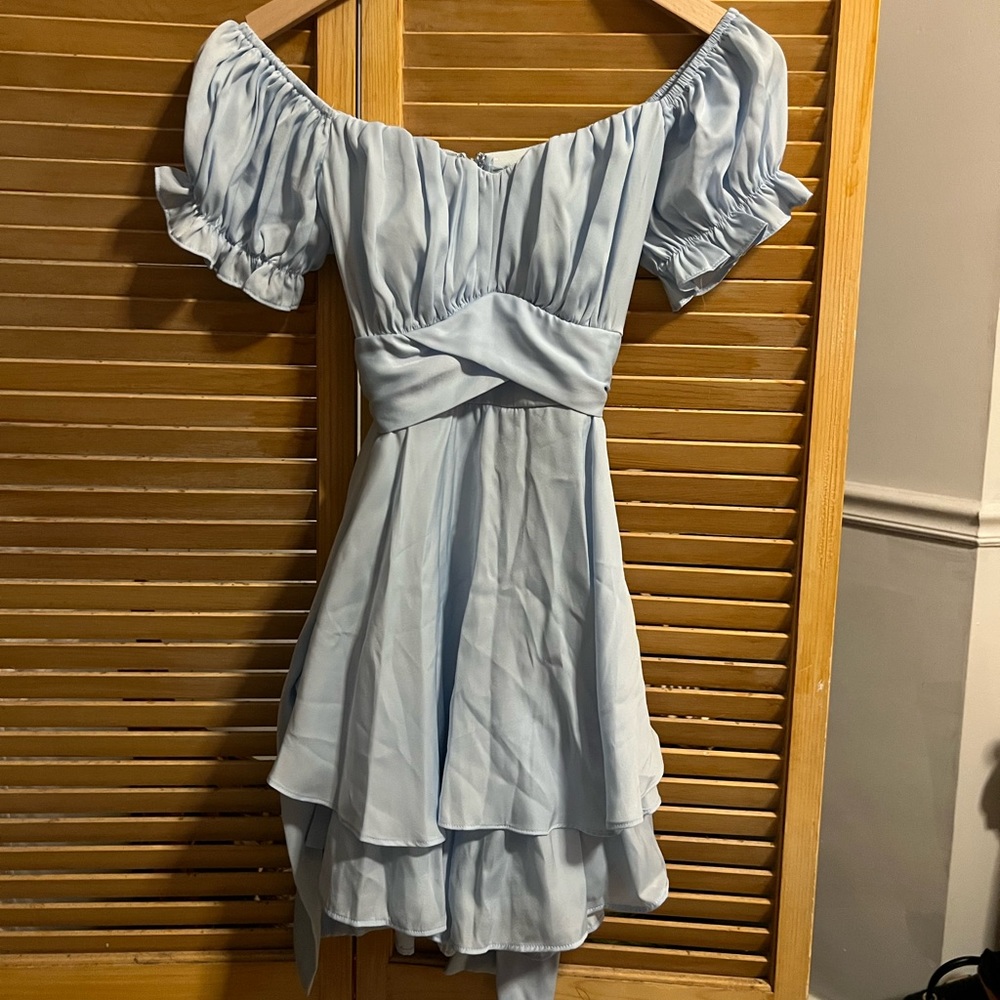 Baby Blue Romper with puff sleeves and hidden back detail